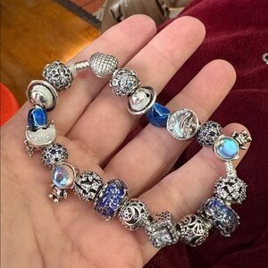 Sterling bracelet with space theme charms